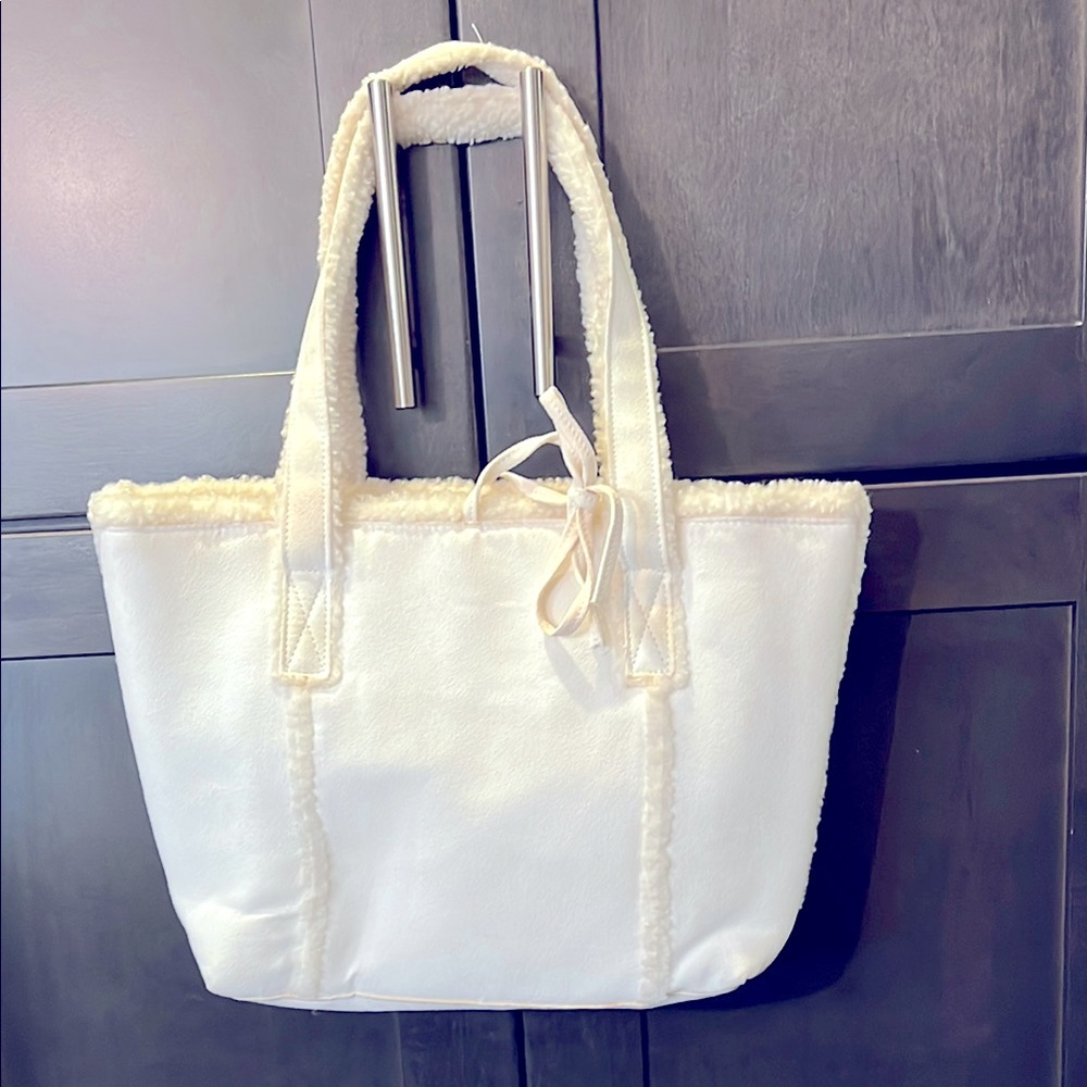 Bath & Body Works White Tote Bag. Feels like suede with wool accents. Tie closes